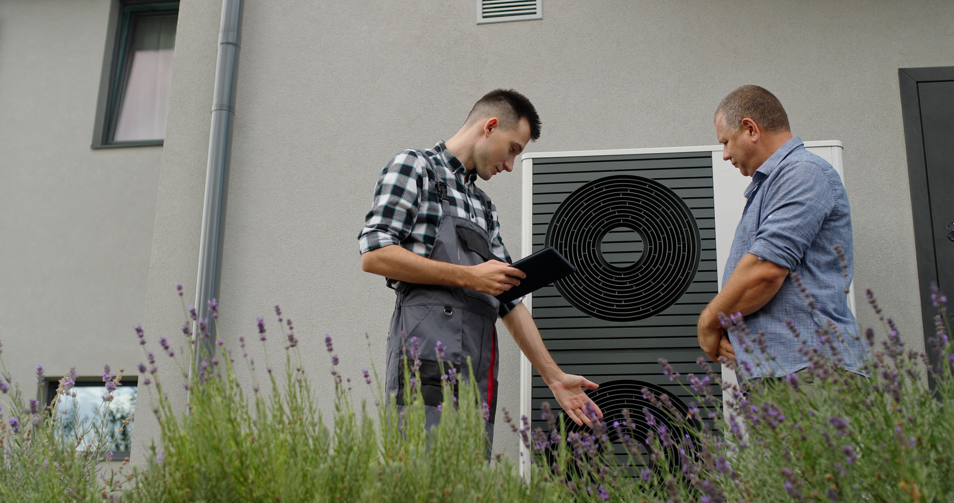 Homeowner consults with technician